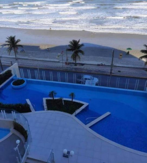 Apartamento pé na areia